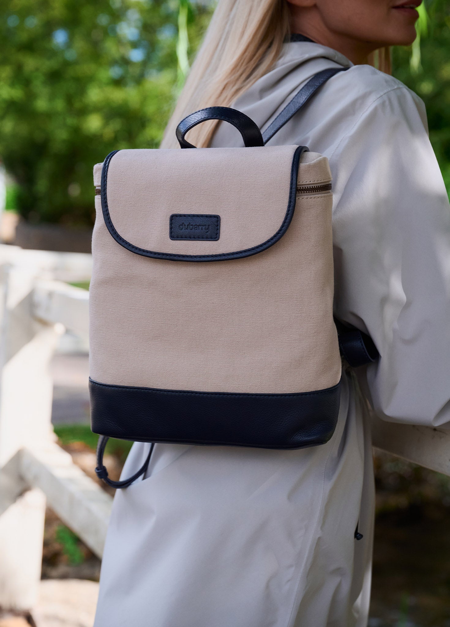 canvas leather backpack navy reinforced with industrial antique brass rivets that speak to its enduring build James Campbell Canvas Leather Backpack